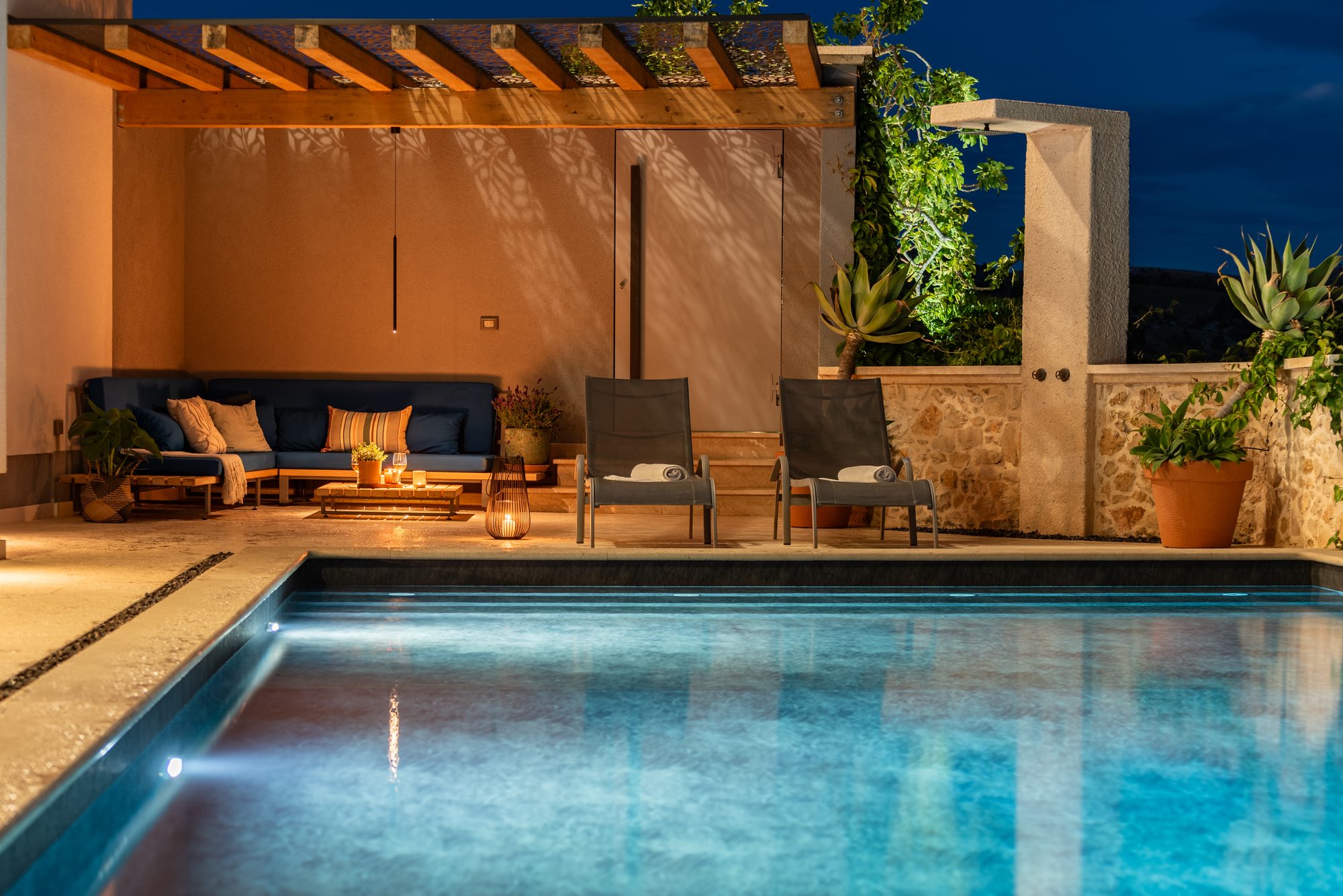 Private swimming pool with sun loungers at the holiday villa in Croatia